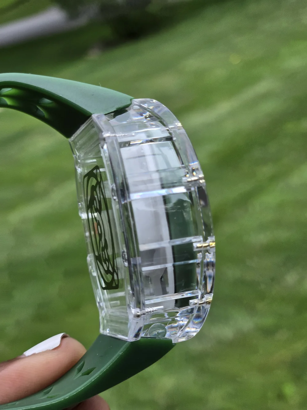 Clear Case Green Dial Mechanical-Style Watch with Gold Accents